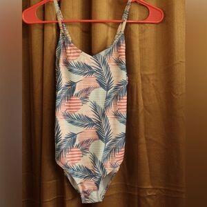 One piece bathing suit size 9/10 with soft blues, reds, pinks Palm leaves & suns